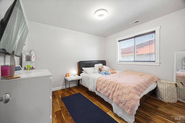 1309 S Pacific St, Boise, ID 83705 - bedroom with wood finished floors