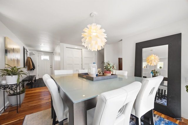 1309 S Pacific St, Boise, ID 83705 - dining space featuring a chandelier and wood finished floors