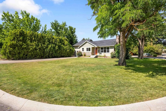 1309 S Pacific St, Boise, ID 83705 - ranch-style house featuring a chimney and a front yard