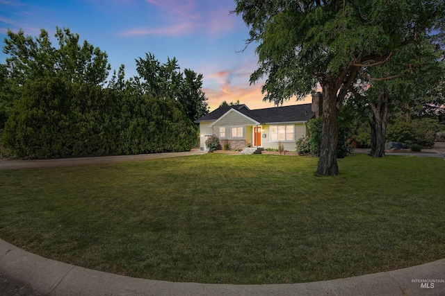 1309 S Pacific St, Boise, ID 83705 - view of front facade featuring a yard and a chimney