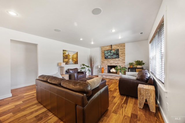 1309 S Pacific St, Boise, ID 83705 - living room featuring wood finished floors, recessed lighting, and a fireplace