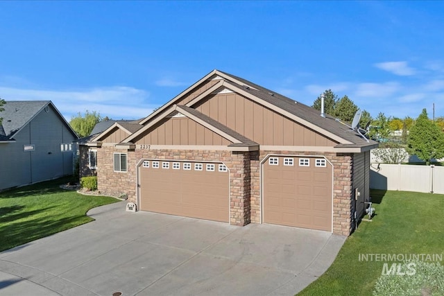craftsman inspired home with concrete driveway, a garage, board and batten siding, and stone siding