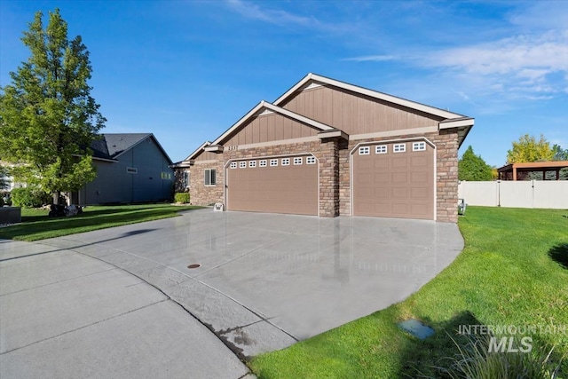 view of front of house with concrete driveway, stone siding, and an attached garage