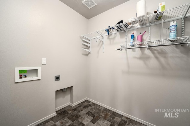 laundry area featuring laundry area, visible vents, baseboards, washer hookup, and electric dryer hookup