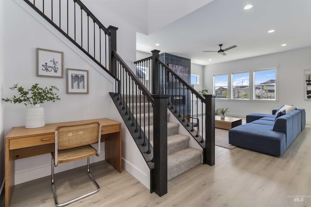 125 S Eagles Roost Way, Eagle, ID 83616 - staircase featuring a ceiling fan, wood finished floors, and recessed lighting