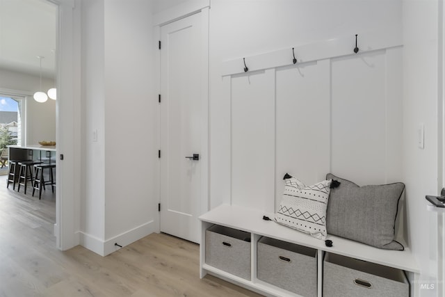 125 S Eagles Roost Way, Eagle, ID 83616 - mudroom featuring light wood finished floors and baseboards