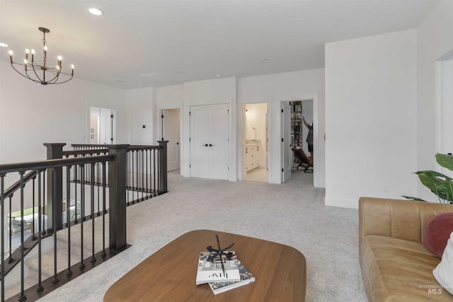 125 S Eagles Roost Way, Eagle, ID 83616 - living room with carpet flooring, a chandelier, and recessed lighting