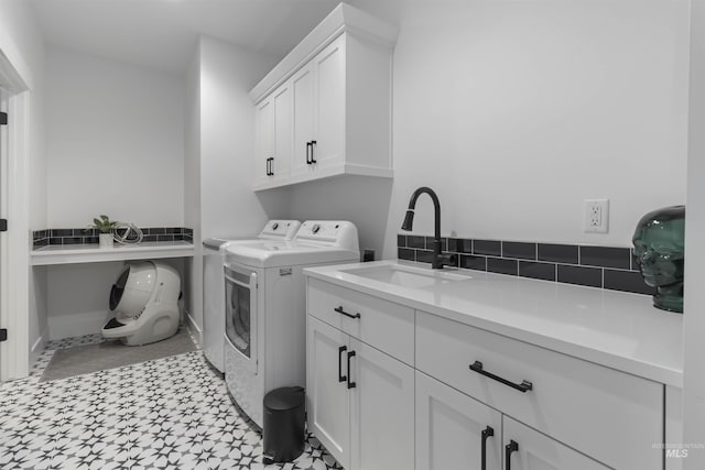 125 S Eagles Roost Way, Eagle, ID 83616 - laundry room with cabinet space and separate washer and dryer
