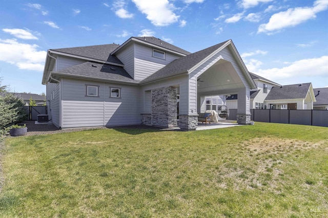 125 S Eagles Roost Way, Eagle, ID 83616 - rear view of house with a patio and a shingled roof