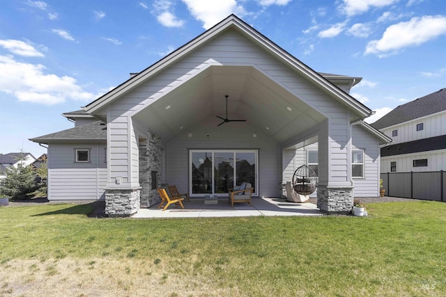 125 S Eagles Roost Way, Eagle, ID 83616 - rear view of property with a ceiling fan, a patio, stone siding, and roof with shingles