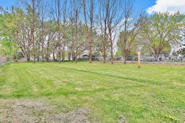 view of yard featuring fence