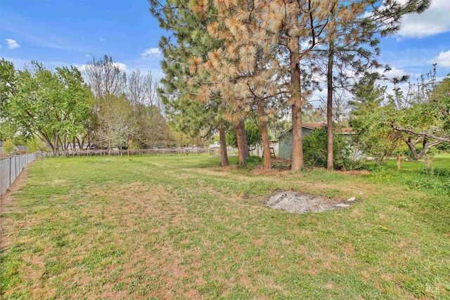 view of yard with fence
