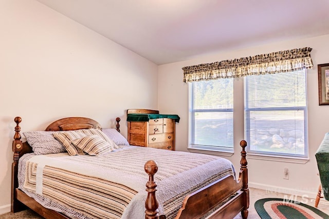 12 Blue Spruce Ct, Cascade, ID 83611 - bedroom with carpet floors, baseboards, and vaulted ceiling