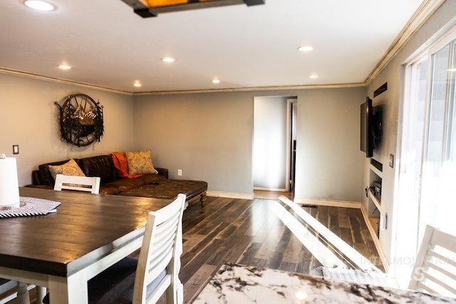 interior space with recessed lighting, wood finished floors, baseboards, and ornamental molding