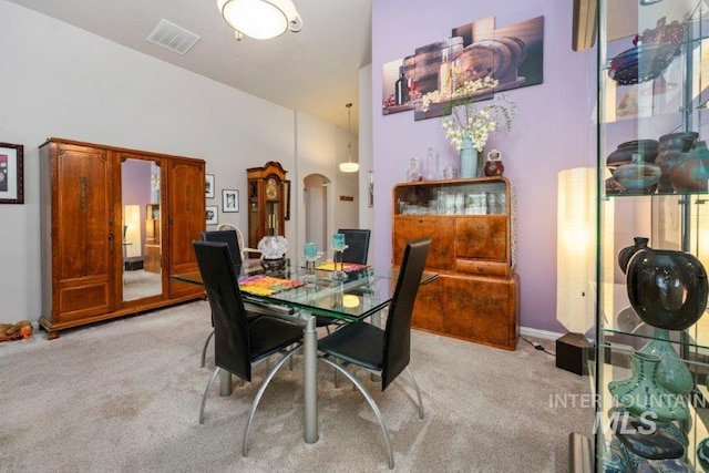 view of carpeted dining space