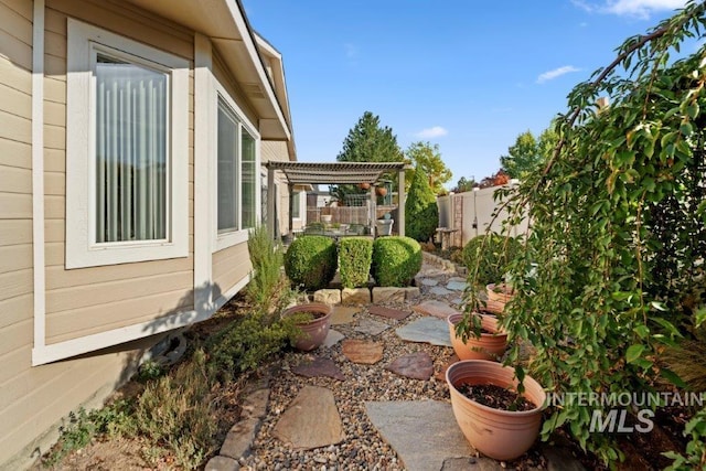 view of yard with a patio area and a pergola