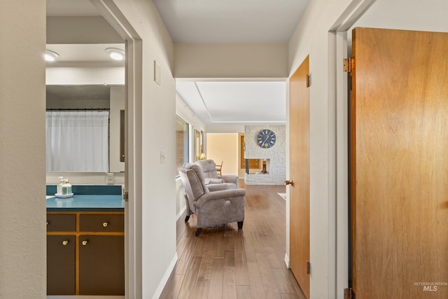 hallway featuring wood-type flooring