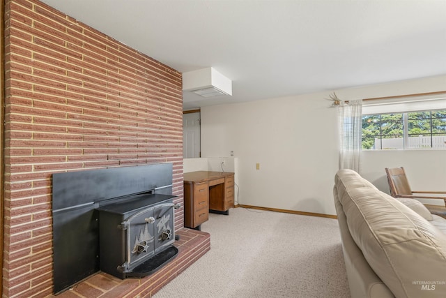 carpeted living room featuring a wood stove