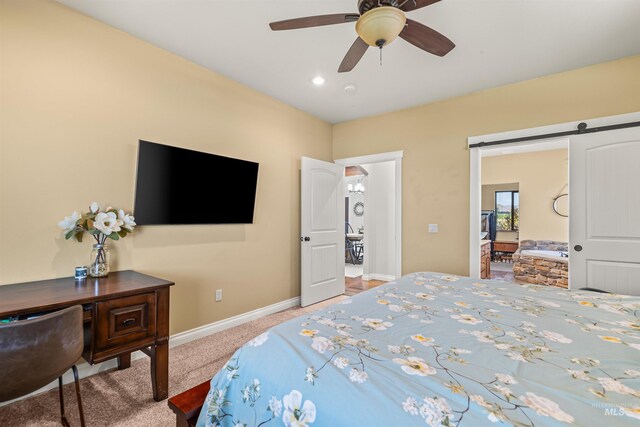 3305 18th St, Lewiston, ID 83501 - carpeted bedroom with baseboards, a barn door, ceiling fan, and recessed lighting