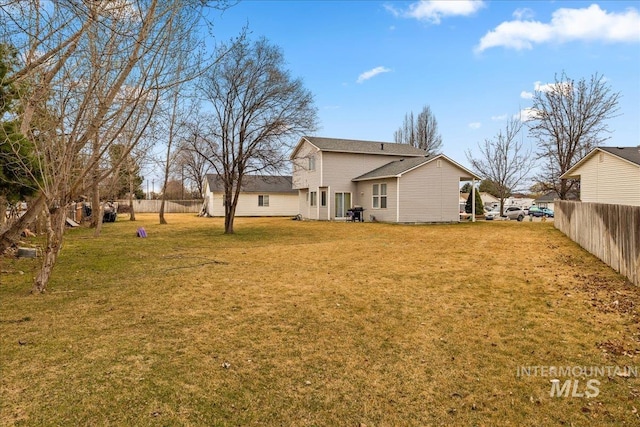 view of yard featuring fence