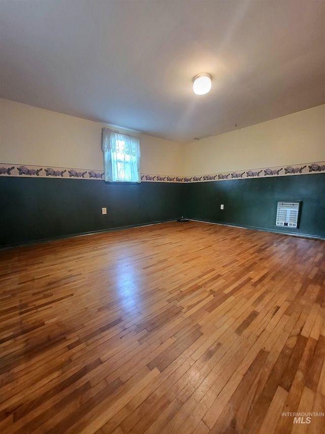 bonus room with wood-type flooring