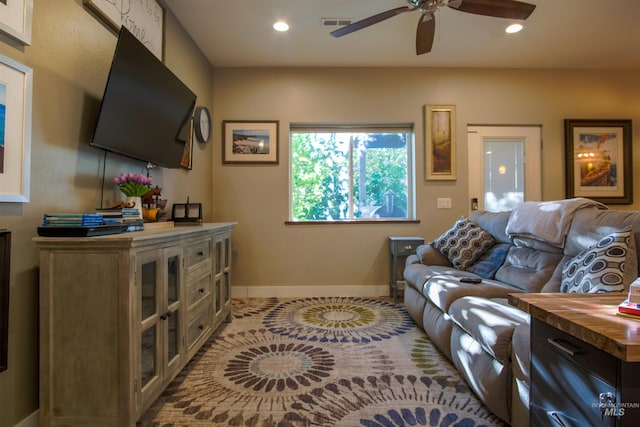 living room featuring ceiling fan