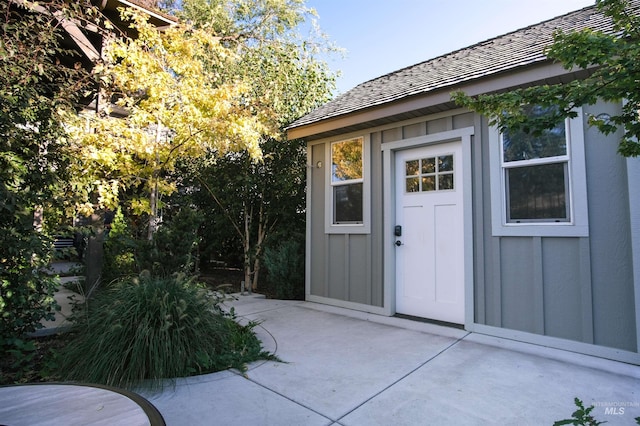property entrance with a patio area
