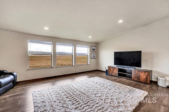 living area with recessed lighting, dark wood-style flooring, baseboards, and vaulted ceiling