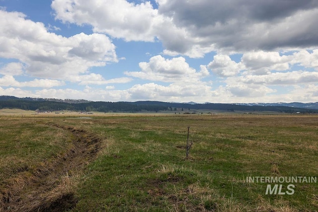 view of mountain feature featuring a rural view