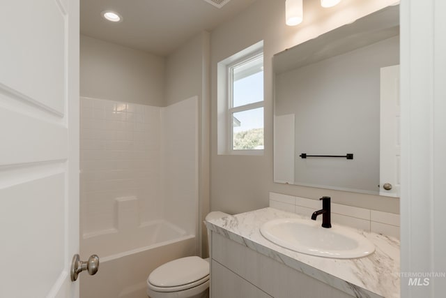 4403 N Magical Creek Ave, Meridian, ID 83646 - full bathroom featuring toilet, vanity, washtub / shower combination, and recessed lighting