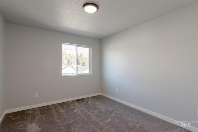 4403 N Magical Creek Ave, Meridian, ID 83646 - empty room featuring baseboards, visible vents, and carpet floors