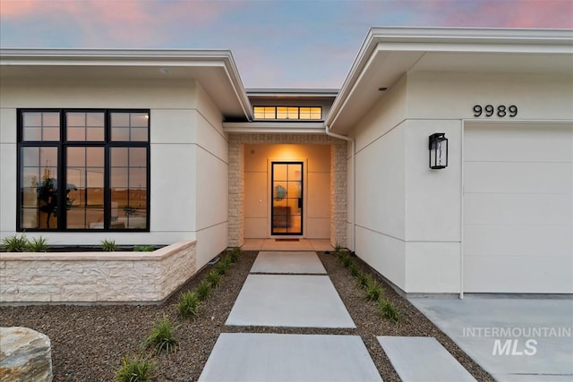 9989 W Bouvardia St, Star, ID 83669 - entrance to property featuring stucco siding and stone siding
