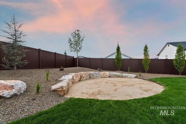 9989 W Bouvardia St, Star, ID 83669 - fenced backyard featuring a patio area