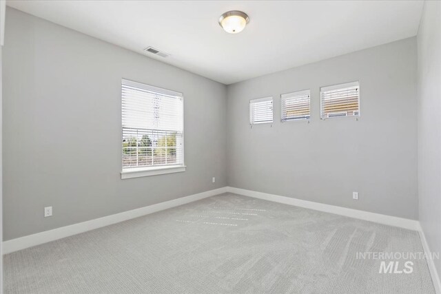 3631 S Pheasant Tail Way, Boise, ID 83716 - unfurnished room with baseboards and light carpet