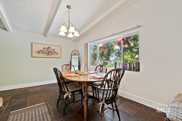 dining room featuring baseboards, beam ceiling, a chandelier, and stone finish floor