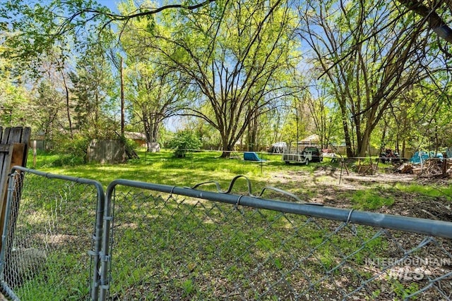 exterior space with fence and a gate