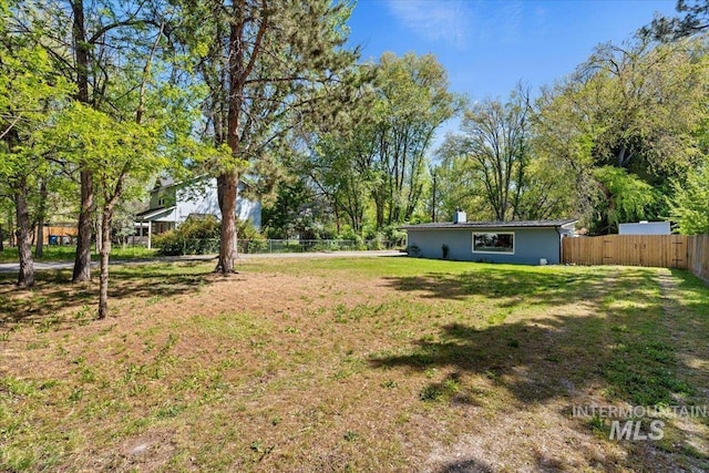 view of yard with fence