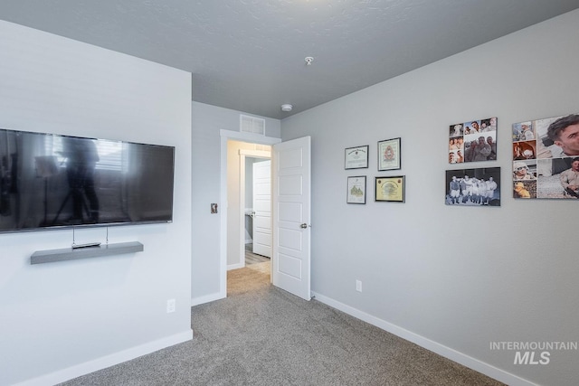 8228 S Bogus Ridge Ave, Boise, ID 83716 - unfurnished bedroom with carpet floors and baseboards