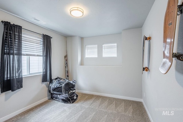 8228 S Bogus Ridge Ave, Boise, ID 83716 - carpeted spare room featuring baseboards