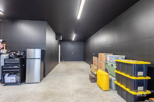 8228 S Bogus Ridge Ave, Boise, ID 83716 - garage featuring freestanding refrigerator