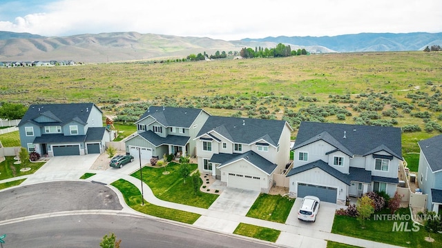 8228 S Bogus Ridge Ave, Boise, ID 83716 - aerial view of residential area with mountains