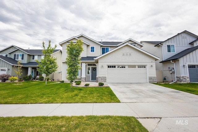 8228 S Bogus Ridge Ave, Boise, ID 83716 - craftsman inspired home featuring stone siding, a garage, concrete driveway, and a front lawn