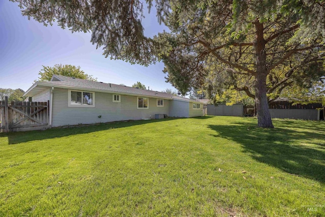 rear view of property featuring cooling unit