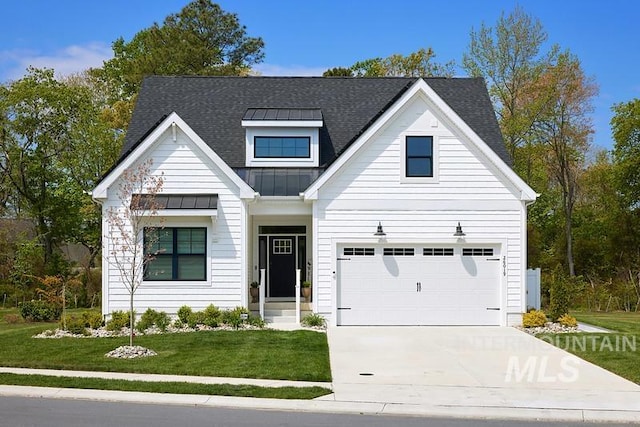 7927 W Rockhaven Dr, Eagle, ID 83616 - view of front facade featuring driveway, a front lawn, a standing seam roof, a shingled roof, and a metal roof