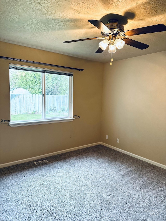 851 W Florida, Nampa, ID 83686 - unfurnished room featuring a textured ceiling, ceiling fan, carpet, and baseboards