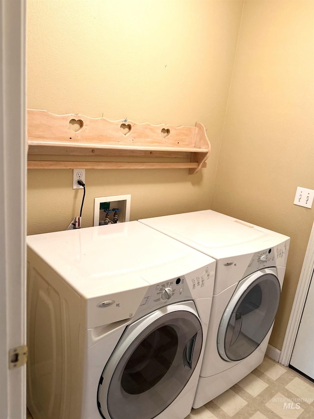 851 W Florida, Nampa, ID 83686 - washroom featuring washing machine and dryer and light flooring