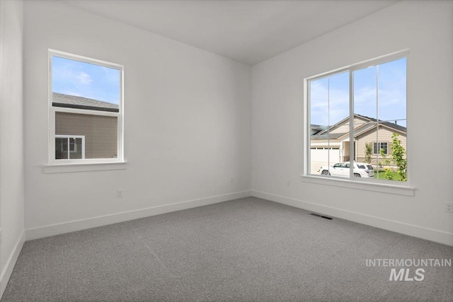 2158 N Kenora Ave, Star, ID 83669 - unfurnished room featuring healthy amount of natural light and carpet