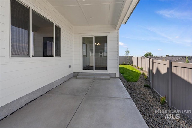2158 N Kenora Ave, Star, ID 83669 - fenced backyard featuring a patio