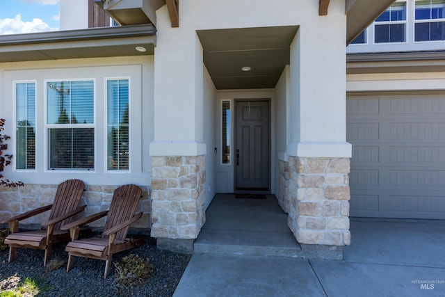 entrance to property with a garage