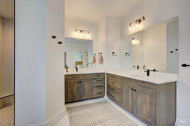 bathroom with tile patterned flooring and vanity